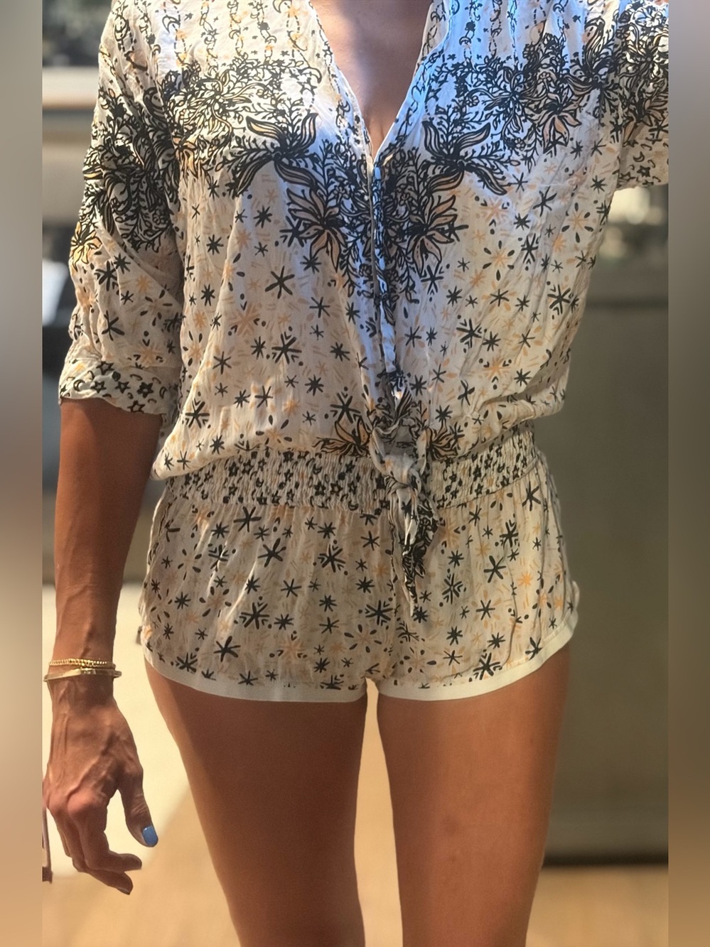 Poupette St. Barth White Romper with Black and Peach Star Print